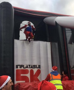 Mark takes on the 'Leap of Faith' at the Inflatable Santa 5k Run in Ipswich